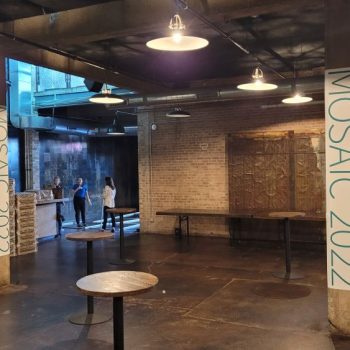 Two vertical pillar wraps with event graphics in an industrial space in Chicago Downtown.