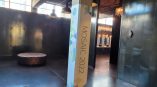 Printed vinyl pillar wrap with geometric patterns and text in an industrial space in Chicago