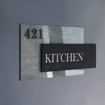 Rectangular layered ADA kitchen room sign with Braille on patterned acrylic in Chicago Downtown.