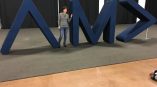 Large freestanding fabric-covered foam letters and arrow tradeshow display in Chicago Downtown.