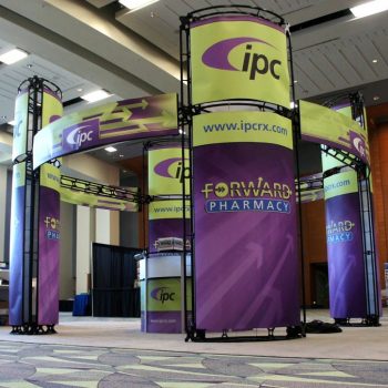 Curved fabric trade show display with metal frame and graphic panels in Chicago Downtown.