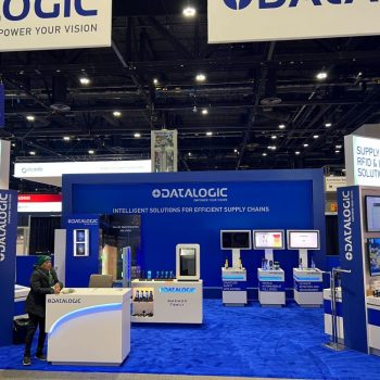 Tradeshow display booth with fabric back wall and illuminated signs in Chicago Downtown.