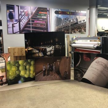 Canvas prints with various photographic images displayed in a workshop in Chicago Downtown.