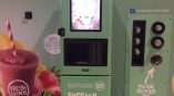 Freestanding digital kiosk with printed vinyl graphics for tradeshow display in Chicago Downtown.