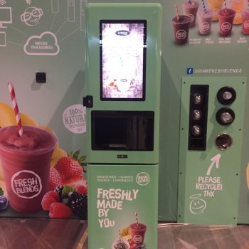 Freestanding digital kiosk with printed vinyl graphics for tradeshow display in Chicago Downtown.