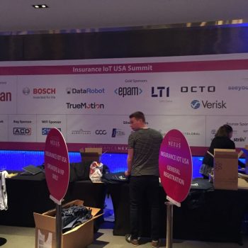 Large fabric event banner with sponsor logos displayed indoors at Chicago Downtown.