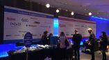 Large fabric event banners mounted on walls at a registration desk in Chicago Downtown.