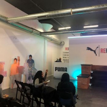 Event space with large wall-mounted vinyl graphics and freestanding cutout signs in Chicago