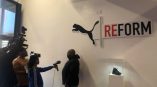 Indoor wall-mounted cutout sign with logo and text at an event in Chicago Downtown.
