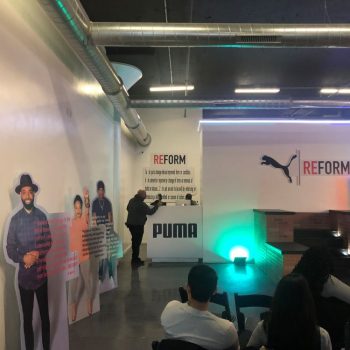 Life-size printed cardboard cutout signs and wall graphics in an event space in Chicago Downtown.