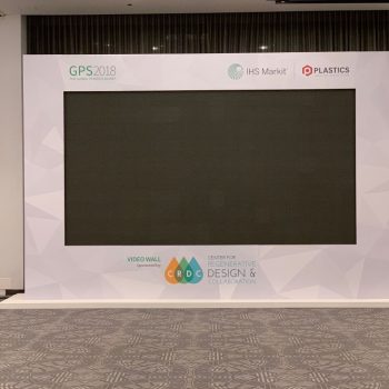 Large freestanding trade show video wall display with printed fabric frame in Chicago Downtown.