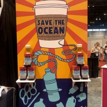 Tradeshow display with printed graphic panel and product shelves in Chicago Downtown.