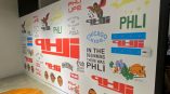 Interior wall mural with various printed vinyl graphics and illustrations in Chicago Downtown.