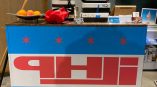Table wrap banner with Chicago flag design displayed indoors in Chicago Downtown.