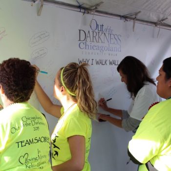 Large vinyl event banner with handwritten messages and signatures in Chicago Downtown.