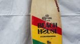 Surfboard with colorful graphic vinyl decals and grip pad displayed in Chicago Downtown.