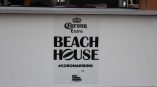 White event banner with printed black text mounted on a metal frame in Chicago Downtown.