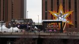 Large event stage banner and star-shaped wall sign installation in Chicago Downtown.