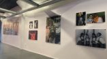 Acrylic wall-mounted photo prints displayed in a gallery space in Chicago Downtown.