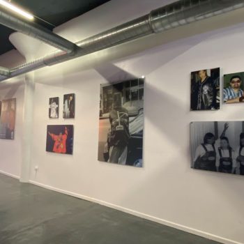 Acrylic wall-mounted photo prints displayed in a gallery space in Chicago Downtown.