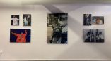 Acrylic photo prints mounted on a white wall in an event space in Chicago Downtown.