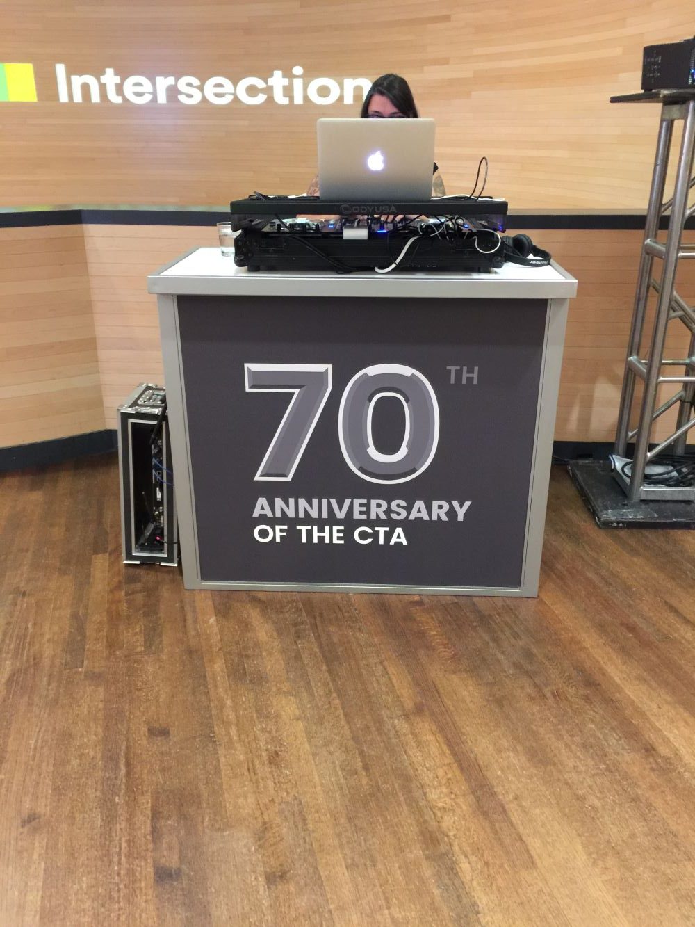Fabric graphic wrap on a portable event counter with wooden floor in Chicago Downtown.
