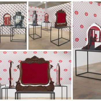 Artistic freestanding cutout signs with vintage mirror shapes on metal stands in Chicago Downtown.