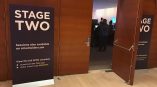 Freestanding fabric banner signage with metal base at event entrance in Chicago Downtown.