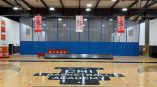 Indoor basketball court floor graphics with logo and text in Chicago Downtown.