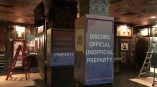 Indoor pillar wrap signage with event graphics on square columns in Chicago Downtown.