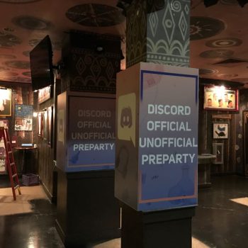 Indoor pillar wrap signage with event graphics on square columns in Chicago Downtown.