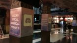 Event pillar wraps with printed graphics on square columns inside a venue in Chicago Downtown.