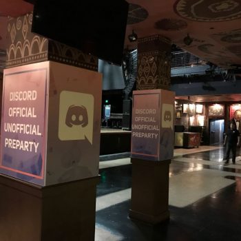 Event pillar wraps with printed graphics on square columns inside a venue in Chicago Downtown.
