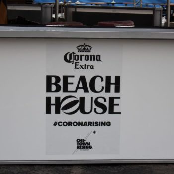 White event banner with printed black text mounted on a metal frame in Chicago Downtown.