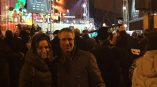 Large fabric event banners hanging on metal truss stage structure in Chicago Downtown.