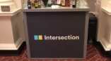 Portable event bar with vinyl graphic wrap and assorted liquor bottles in Chicago Downtown.