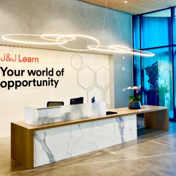 Large white event board with colorful handwritten messages and signatures in Chicago Downtown.