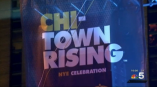 Large fabric event banner with printed graphics displayed in Chicago Downtown.