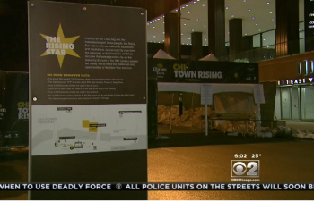 Freestanding outdoor event sign with printed graphics on metal panel in Chicago Downtown.