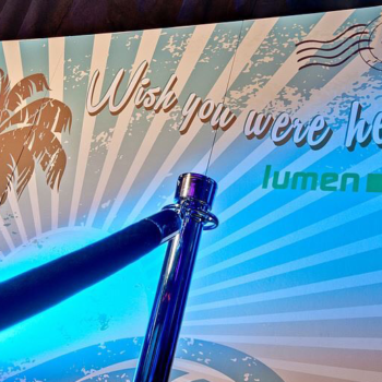 Hennessy black photo backdrop that says Wish you were here