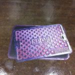 Custom floor graphic made to look like an open grate