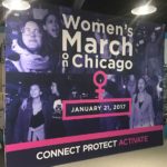 Large women's march in chicago banner