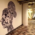 Custom mechanical head wall graphic