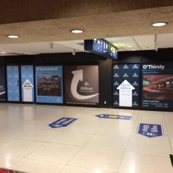 Hilton window graphics in airport