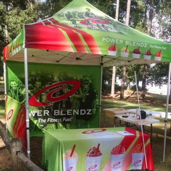 Event tent and accessories promoting Power Blendz fitness fuel