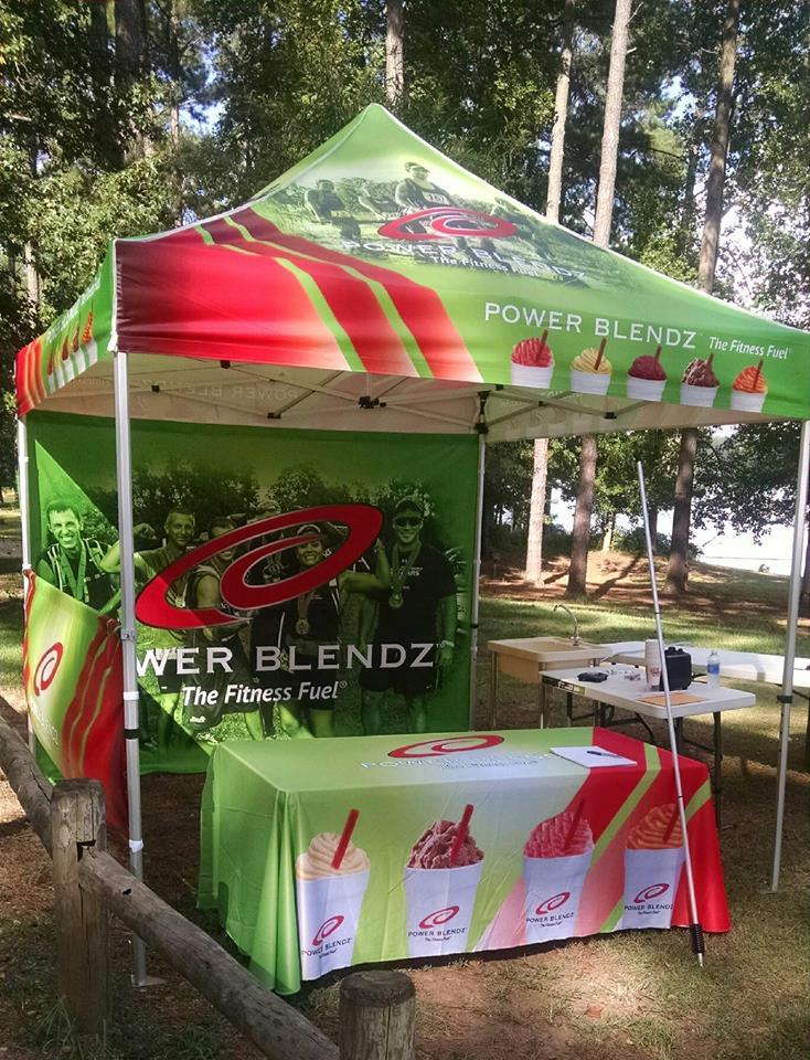 Event tent and accessories promoting Power Blendz fitness fuel