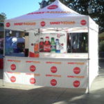 Event tent promoting Family Dollar and Coca-Cola