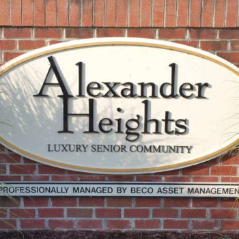 Outdoor sign promoting Alexander Heights Luxury Senior Community