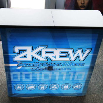 Table topper promoting 2Krew Security & Surveillance
