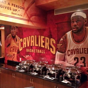 Wall mural promoting Cavaliers basketball team at catered event